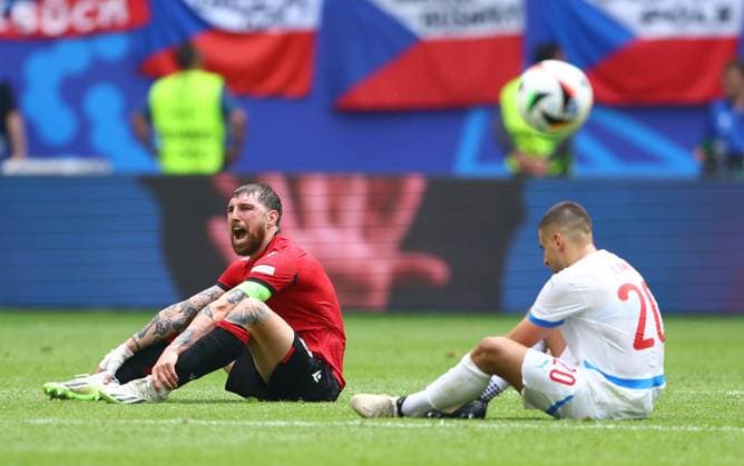 Guram Kashia of Georgia and Ondrej Lingr of Czech Republic show a look of dejection at full time Georgia v Czechia, UEFA European Championship, EM, Europameisterschaft 2024, Group F, Football, Volksparkstadion, Hamburg, Germany, 22 Jun 2024 EDITORIAL USE ONLY No use with unauthorised audio, video, data, fixture lists, club league logos or live services. Online in-match use limited to 120 images, no video emulation. No use in betting, games or single club league player publications. Copyright: xKieranxMcManus Shutterstockx 14548025cr