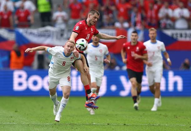 Michal Sadilek of Czech Republic and Giorgi Chakvetadze of Georgia compete for the ball Georgia v Czechia, UEFA European Championship, EM, Europameisterschaft 2024, Group F, Football, Volksparkstadion, Hamburg, Germany, 22 Jun 2024 EDITORIAL USE ONLY No use with unauthorised audio, video, data, fixture lists, club league logos or live services. Online in-match use limited to 120 images, no video emulation. No use in betting, games or single club league player publications. Copyright: xKieranxMcManus Shutterstockx 14548025dz