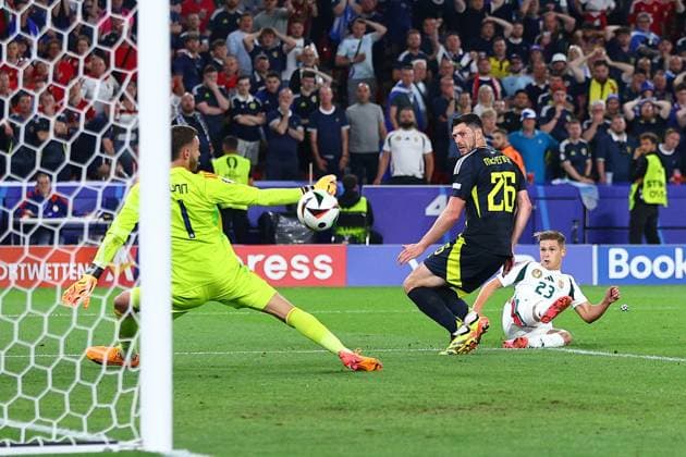 Kevin Csoboth of Hungary shoots at goal and hits the post Scotland v Hungary, UEFA European Championship, EM, Europameisterschaft 2024, Group A, Football, Stuttgart Arena, Stuttgart, Germany, 23 Jun 2024 EDITORIAL USE ONLY No use with unauthorised audio, video, data, fixture lists, club league logos or live services. Online in-match use limited to 120 images, no video emulation. No use in betting, games or single club league player publications. Copyright: xMichaelxZemanek Shutterstockx 14548075be