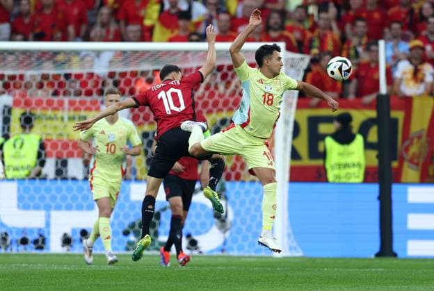 Nedim Bajrami of Albania challenges Martin Zubimendi of Spain to a header Albania v Spain, UEFA European Championship, EM, Europameisterschaft 2024, Group B, Football, Dusseldorf Arena, Dusseldorf, Germany, 24 Jun 2024 EDITORIAL USE ONLY No use with unauthorised audio, video, data, fixture lists, club league logos or live services. Online in-match use limited to 120 images, no video emulation. No use in betting, games or single club league player publications. Copyright: xPaulxCurrie Shutterstockx 14551058am