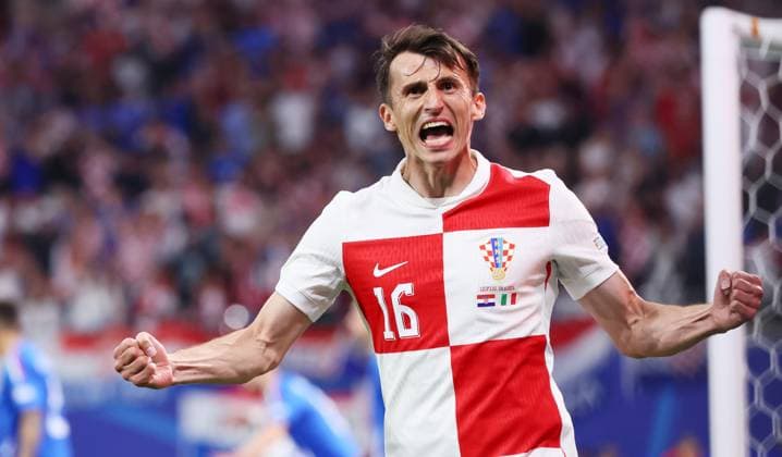 Kroatien - Italien UEFA EURO, EM, Europameisterschaft,Fussball 2024 Leipzig, 24.06.2024, Leipzig Stadium, Fußball, UEFA EURO 2024 Germany , Gruppe B, Vorrunde , Kroatien CRO vs. Italien ITA , Im Bild: Tor für Kroatien. Luka ModricÊ(10, Kroatien) trifft zum 1:0. Ante Budimir (16, Kroatien) jubelt. , Nur für journalistische Zwecke. Only for editorial use! , UEFA Êregulations prohibit any use of photographs as image sequences and or quasi-video. ,