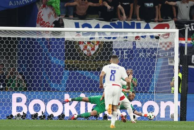 Gianluigi Donnarumma of Italy saves Luka Modric of Croatia s penalty Croatia v Italy, UEFA European Championship, EM, Europameisterschaft 2024, Group B, Football, Leipzig Stadium, Leipzig, Germany, 24 Jun 2024 EDITORIAL USE ONLY No use with unauthorised audio, video, data, fixture lists, club league logos or live services. Online in-match use limited to 120 images, no video emulation. No use in betting, games or single club league player publications. Copyright: xMattxWest Shutterstockx 14551036bv