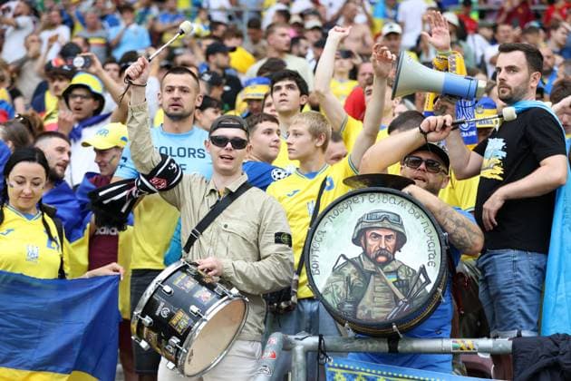 Ukraine fans with drums in the stands Ukraine v Belgium, UEFA European Championship, EM, Europameisterschaft 2024, Group E, Football, Stuttgart Arena, Stuttgart, Germany - 26 Jun 2024 EDITORIAL USE ONLY No use with unauthorised audio, video, data, fixture lists, club league logos or live services. Online in-match use limited to 120 images, no video emulation. No use in betting, games or single club league player publications. Copyright: xMichaelxZemanek Shutterstockx 14555605g