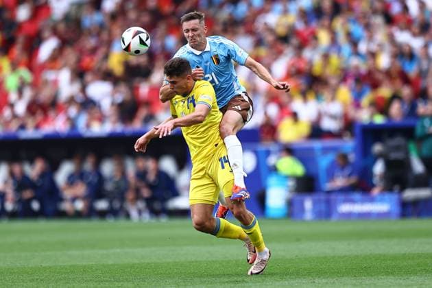 Heorhiy Sudakov of Ukraine and Timothy Castagne of Belgium Ukraine v Belgium, UEFA European Championship, EM, Europameisterschaft 2024, Group E, Football, Stuttgart Arena, Stuttgart, Germany - 26 Jun 2024 EDITORIAL USE ONLY No use with unauthorised audio, video, data, fixture lists, club league logos or live services. Online in-match use limited to 120 images, no video emulation. No use in betting, games or single club league player publications. Copyright: xMichaelxZemanek Shutterstockx 14555605y