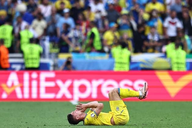 A dejected looking Heorhiy Sudakov of Ukraine Ukraine v Belgium, UEFA European Championship, EM, Europameisterschaft 2024, Group E, Football, Stuttgart Arena, Stuttgart, Germany - 26 Jun 2024 EDITORIAL USE ONLY No use with unauthorised audio, video, data, fixture lists, club league logos or live services. Online in-match use limited to 120 images, no video emulation. No use in betting, games or single club league player publications. Copyright: xMichaelxZemanek Shutterstockx 14555605bo