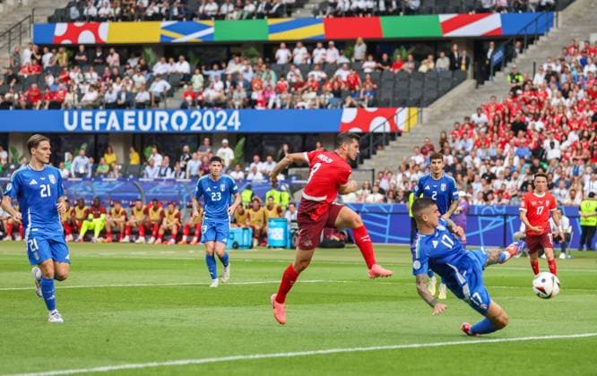 Remo Freuler of Switzerland scores the opening goal 1-0 Switzerland v Italy, UEFA European Championship, EM, Europameisterschaft 2024, Round of 16, Football, Olympiastadion, Berlin, Germany - 29 Jun 2024 EDITORIAL USE ONLY No use with unauthorised audio, video, data, fixture lists, club league logos or live services. Online in-match use limited to 120 images, no video emulation. No use in betting, games or single club league player publications. Copyright: xPaulxCurrie Shutterstockx 14562043az
