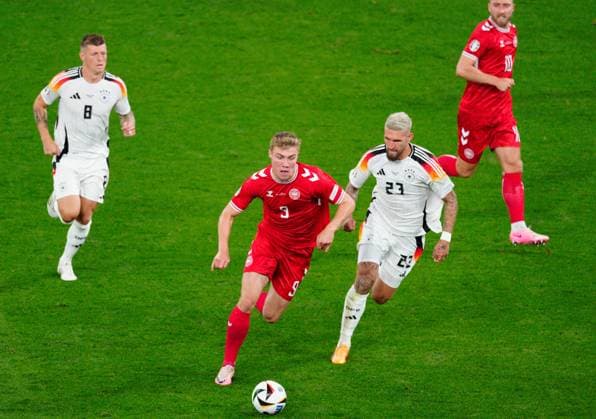 Rasmus Hojlund of Denmark and Robert Andrich of Germany Germany v Denmark, UEFA European Championship, EM, Europameisterschaft 2024, Round of 16, Football, BVB Stadion, Dortmund, Germany - 29 Jun 2024 EDITORIAL USE ONLY No use with unauthorised audio, video, data, fixture lists, club league logos or live services. Online in-match use limited to 120 images, no video emulation. No use in betting, games or single club league player publications. Copyright: xDavexShopland Shutterstockx 14562067f
