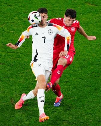Kai Havertz of Germany and Andreas Christensen of Denmark Germany v Denmark, UEFA European Championship, EM, Europameisterschaft 2024, Round of 16, Football, BVB Stadion, Dortmund, Germany - 29 Jun 2024 EDITORIAL USE ONLY No use with unauthorised audio, video, data, fixture lists, club league logos or live services. Online in-match use limited to 120 images, no video emulation. No use in betting, games or single club league player publications. Copyright: xDavexShopland Shutterstockx 14562067l