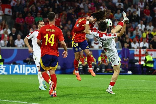 Khvicha Kvaratskhelia of Georgia attempts an over head kick before it is headed clear by Marc Cucurella of Spain Spain v Georgia, UEFA European Championship, EM, Europameisterschaft 2024, Round of 16, Football, Cologne Stadium, Cologne, Germany - 30 Jun 2024 EDITORIAL USE ONLY No use with unauthorised audio, video, data, fixture lists, club league logos or live services. Online in-match use limited to 120 images, no video emulation. No use in betting, games or single club league player publications. Copyright: xMichaelxZemanek Shutterstockx 14562306ah