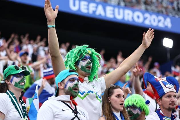 Slovenia stands in the stands Portugal v Slovenia, UEFA European Championship, EM, Europameisterschaft 2024, Round of 16, Football, Frankfurt Arena, Frankfurt, Germany - 01 Jul 2024 EDITORIAL USE ONLY No use with unauthorised audio, video, data, fixture lists, club league logos or live services. Online in-match use limited to 120 images, no video emulation. No use in betting, games or single club league player publications. Copyright: xMichaelxZemanek Shutterstockx 14566640e