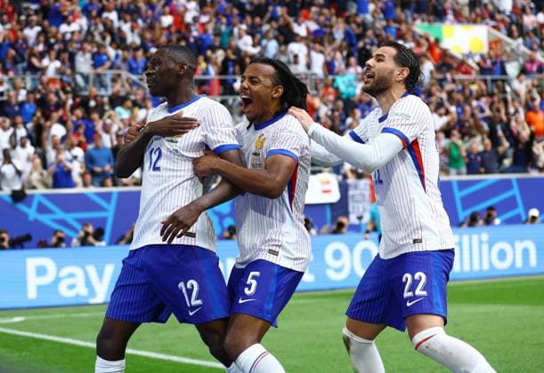 Randal Kolo Muani of France celebrates as he shot is deflected by Jan Vertonghen of Belgium to make it 1-0 with Jules Koundà of France and Thà o Hernandez of France France v Belgium, UEFA European Championship, EM, Europameisterschaft 2024, Round of 16, Football, Dusseldorf Arena, Dusseldorf, Germany - 01 Jul 2024 EDITORIAL USE ONLY No use with unauthorised audio, video, data, fixture lists, club league logos or live services. Online in-match use limited to 120 images, no video emulation. No use in betting, games or single club league player publications. Copyright: xKieranxMcManus Shutterstockx 14566634cj