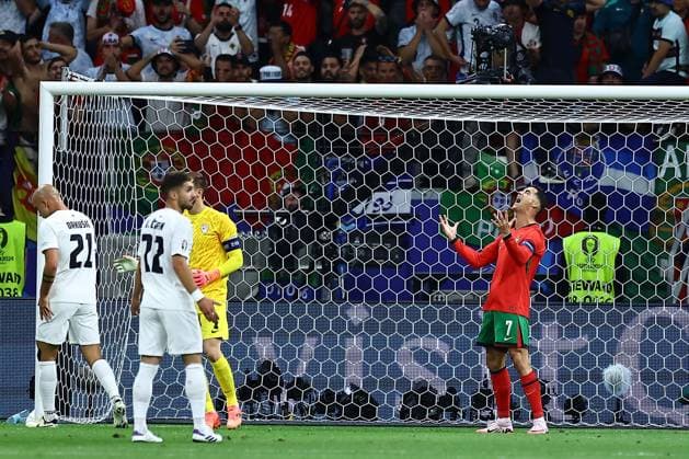 Cristiano Ronaldo of Portugal reacts Portugal v Slovenia, UEFA European Championship, EM, Europameisterschaft 2024, Round of 16, Football, Frankfurt Arena, Frankfurt, Germany - 01 Jul 2024 EDITORIAL USE ONLY No use with unauthorised audio, video, data, fixture lists, club league logos or live services. Online in-match use limited to 120 images, no video emulation. No use in betting, games or single club league player publications. Copyright: xMichaelxZemanek Shutterstockx 14566640ai