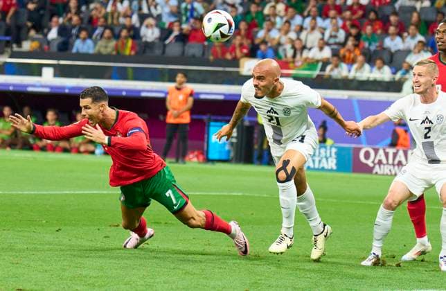Cristiano RONALDO, Por 7 compete for the ball, tackling, duel, header, zweikampf, action, fight against Vanja Drusic, SVN 21 in the best of 16 match PORTUGAL - SLOVENIA of the UEFA European Championships 2024 on Jul 01, 2024 in Frankfurt, Germany.