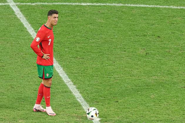Cristiano Ronaldo of Portugal is consoled after missing a penalty Portugal v Slovenia, UEFA European Championship, EM, Europameisterschaft 2024, Round of 16, Football, Frankfurt Arena, Frankfurt, Germany - 01 Jul 2024 EDITORIAL USE ONLY No use with unauthorised audio, video, data, fixture lists, club league logos or live services. Online in-match use limited to 120 images, no video emulation. No use in betting, games or single club league player publications. Copyright: xPaulxCurrie Shutterstockx 14566636fn