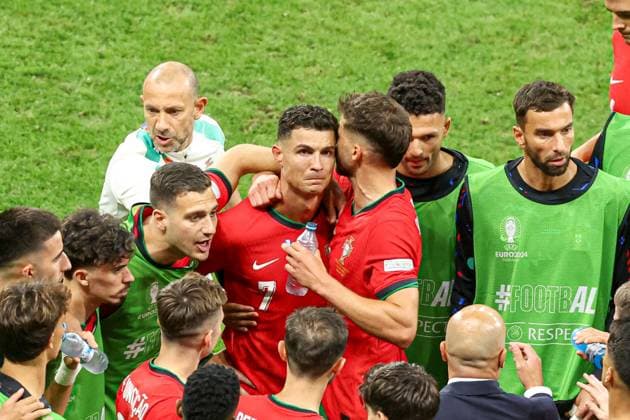 Cristiano Ronaldo of Portugal is consoled after missing a penalty Portugal v Slovenia, UEFA European Championship, EM, Europameisterschaft 2024, Round of 16, Football, Frankfurt Arena, Frankfurt, Germany - 01 Jul 2024 EDITORIAL USE ONLY No use with unauthorised audio, video, data, fixture lists, club league logos or live services. Online in-match use limited to 120 images, no video emulation. No use in betting, games or single club league player publications. Copyright: xPaulxCurrie Shutterstockx 14566636fj