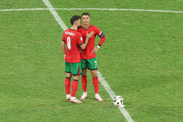 Cristiano Ronaldo of Portugal is consoled by Bruno Fernandes after missing a penalty Portugal v Slovenia, UEFA European Championship, EM, Europameisterschaft 2024, Round of 16, Football, Frankfurt Arena, Frankfurt, Germany - 01 Jul 2024 EDITORIAL USE ONLY No use with unauthorised audio, video, data, fixture lists, club league logos or live services. Online in-match use limited to 120 images, no video emulation. No use in betting, games or single club league player publications. Copyright: xPaulxCurrie Shutterstockx 14566636fu