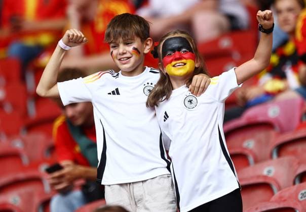 Germany fans with face paint in the stadium ahead of the game Spain v Germany, UEFA European Championship, EM, Europameisterschaft 2024, Quarter Final, Football, Stuttgart Arena, Stuttgart, Germany, 05 Jul 2024 EDITORIAL USE ONLY No use with unauthorised audio, video, data, fixture lists, club league logos or live services. Online in-match use limited to 120 images, no video emulation. No use in betting, games or single club league player publications. Copyright: xMichaelxZemanek Shutterstockx 14571380d