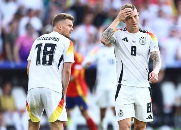 Toni Kroos of Germany and Maximilian Mittelstädt of Germany react Spain v Germany, UEFA European Championship, EM, Europameisterschaft 2024, Quarter Final, Football, Stuttgart Arena, Stuttgart, Germany, 05 Jul 2024 EDITORIAL USE ONLY No use with unauthorised audio, video, data, fixture lists, club league logos or live services. Online in-match use limited to 120 images, no video emulation. No use in betting, games or single club league player publications. Copyright: xMichaelxZemanek Shutterstockx 14571380cd