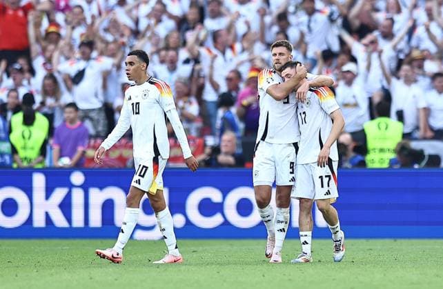 Florian Wirtz of Germany celebrates scoring a goal to make it 1-1 with Niclas Füllkrug of Germany Spain v Germany, UEFA European Championship, EM, Europameisterschaft 2024, Quarter Final, Football, Stuttgart Arena, Stuttgart, Germany, 05 Jul 2024 EDITORIAL USE ONLY No use with unauthorised audio, video, data, fixture lists, club league logos or live services. Online in-match use limited to 120 images, no video emulation. No use in betting, games or single club league player publications. Copyright: xMichaelxZemanek Shutterstockx 14571380cm