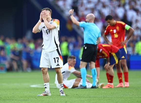 Florian Wirtz of Germany reacts Spain v Germany, UEFA European Championship, EM, Europameisterschaft 2024, Quarter Final, Football, Stuttgart Arena, Stuttgart, Germany, 05 Jul 2024 EDITORIAL USE ONLY No use with unauthorised audio, video, data, fixture lists, club league logos or live services. Online in-match use limited to 120 images, no video emulation. No use in betting, games or single club league player publications. Copyright: xMichaelxZemanek Shutterstockx 14571380cy