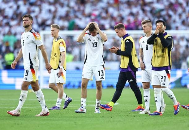 Thomas Müller of Germany shows a look of dejection at full time Spain v Germany, UEFA European Championship, EM, Europameisterschaft 2024, Quarter Final, Football, Stuttgart Arena, Stuttgart, Germany, 05 Jul 2024 EDITORIAL USE ONLY No use with unauthorised audio, video, data, fixture lists, club league logos or live services. Online in-match use limited to 120 images, no video emulation. No use in betting, games or single club league player publications. Copyright: xMichaelxZemanek Shutterstockx 14571380dz