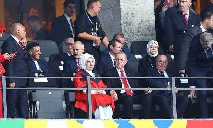 President of Türkiye Recep Tayyip Erdogan with Mesut Özil behind left Netherlands v Turkiye, UEFA European Championship, EM, Europameisterschaft 2024, Quarter Final, Football, Olympiastadion, Berlin, Germany, 06 Jul 2024 EDITORIAL USE ONLY No use with unauthorised audio, video, data, fixture lists, club league logos or live services. Online in-match use limited to 120 images, no video emulation. No use in betting, games or single club league player publications. Copyright: xKieranxMcManus Shutterstockx 14571393r