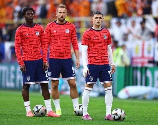 Kobbie Mainoo of England and Phil Foden of England during warm up Netherlands v England, UEFA European Championship, EM, Europameisterschaft 2024, Semi Final, Football, BVB Stadion, Dortmund, Germany, 10 Jul 2024 EDITORIAL USE ONLY No use with unauthorised audio, video, data, fixture lists, club league logos or live services. Online in-match use limited to 120 images, no video emulation. No use in betting, games or single club league player publications. Copyright: xMichaelxZemanek Shutterstockx 14576899ap