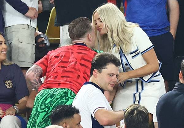 Jordan Pickford of England with wife, Megan Pickford after the game Netherlands v England, UEFA European Championship, EM, Europameisterschaft 2024, Semi Final, Football, BVB Stadion, Dortmund, Germany, 10 Jul 2024 EDITORIAL USE ONLY No use with unauthorised audio, video, data, fixture lists, club league logos or live services. Online in-match use limited to 120 images, no video emulation. No use in betting, games or single club league player publications. Copyright: xMichaelxZemanek Shutterstockx 14576899fg