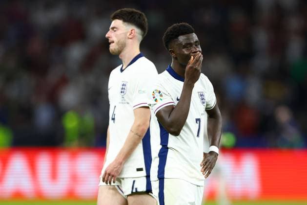 Bukayo Saka of England and Declan Rice of England show a look of dejection at full-time Spain v England, UEFA European Championship, EM, Europameisterschaft 2024, Final, Football, Olympiastadion, Berlin, Germany, 14 Jul 2024 EDITORIAL USE ONLY No use with unauthorised audio, video, data, fixture lists, club league logos or live services. Online in-match use limited to 120 images, no video emulation. No use in betting, games or single club league player publications. Copyright: xKieranxMcManus Shutterstockx 14583341ef
