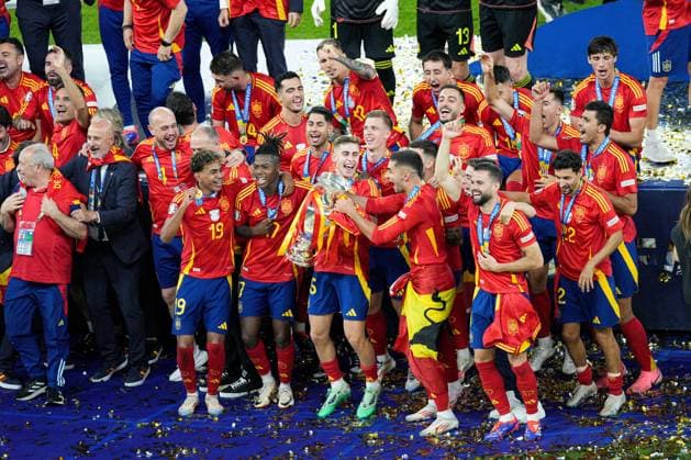 Spain players lifts the 2024 UEFA European Football Championship trophy Spain v England, UEFA European Championship, EM, Europameisterschaft 2024, Final, Football, Olympiastadion, Berlin, Germany, 14 Jul 2024 EDITORIAL USE ONLY No use with unauthorised audio, video, data, fixture lists, club league logos or live services. Online in-match use limited to 120 images, no video emulation. No use in betting, games or single club league player publications. Copyright: xDavexShopland Shutterstockx 14583342fo