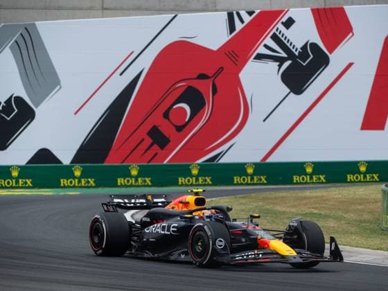 Sergio Checo Perez (Oracle Red Bull Racing, Mexiko, 11) im RedBull RB20 vor dem Gemaelde eines roten Formel 1 - Auto und Rolex Branding, HUN, Formel 1 Weltmeisterschaft, Grand Prix von Ungarn, Hungaroring, Freies Training, 20.07.2024 HUN, Formel 1 Weltmeisterschaft, Grand Prix von Ungarn, Hungaroring, Freies Training, 20.07.2024 Mogyorod Copyright: xEibner-Pressefoto Memmlerx EP_MMR
