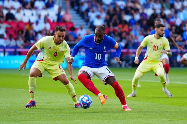 Alexandre Lacazette of France is put under pressure by Eric Garcia of Spain during the Olympic Men s Football Final, France v Spain Paris 2024 Olympic Games, Olympische Spiele, Olympia, OS Day Fourteen, Paris, France - 09 Aug 2024 EDITORIAL USE ONLY No use with unauthorised audio, video, data, fixture lists (outside the EU), club league logos or live services. Online in-match use limited to 45 images (+15 in extra time). No use to emulate moving images. No use in betting, games or Copyright: xJavierxGarcia Shutterstockx 14622991v