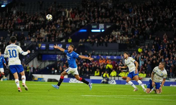 Cyriel Dessers of Rangers claims for a penalty kick after his shot at goal hit Denys Popov of Dynamo Kyiv on the arm. Rangers v Dynamo Kyiv, UEFA Champions League, Third Qualifying Round, Second Leg, Football, Hampden Park, Glasgow, UK, 13 Aug 2024 EDITORIAL USE ONLY No use with unauthorised audio, video, data, fixture lists, club league logos or live services. Online in-match use limited to 120 images, no video emulation. No use in betting, games or single club league player publications. Copyright: xStuartxWallace Shutterstockx 14633326cc