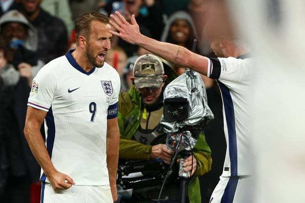 Harry Kane of England celebrates scoring the opening goal for their side with their teammates on their 100th England cap England v Finland, UEFA Nations League, League B, Group 2, Football, Wembley Stadium, London, UK, 10 Sep 2024 EDITORIAL USE ONLY No use with unauthorised audio, video, data, fixture lists, club league logos or live services. Online in-match use limited to 120 images, no video emulation. No use in betting, games or single club league player publications. Copyright: xKieranxMcManus Shutterstockx 14706825cv