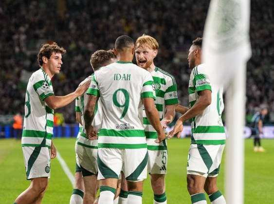 Liam Scales of Celtic celebrates with Adam Idah of Celtic after Idah scored to give Celtic a 5-1 lead. Celtic v Slovan Bratislava, UEFA Champions League, Group Stage, Football, Celtic Park, Glasgow, Scotland, UK, 18 Sep 2024 EDITORIAL USE ONLY No use with unauthorised audio, video, data, fixture lists, club league logos or live services. Online in-match use limited to 120 images, no video emulation. No use in betting, games or single club league player publications. Copyright: xStuartxWallace Shutterstockx 14722221bp