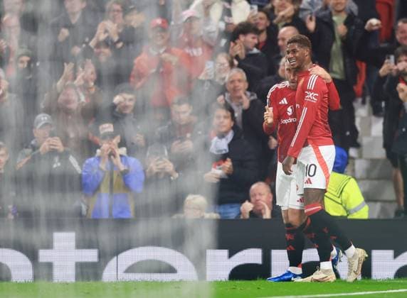 Christian Eriksen of Manchester United, ManU celebrates scoring the opening goal with Marcus Rashford Manchester United v FC Twente, UEFA Europa League, Group Stage, Football, Old Trafford, Manchester, UK, 25 Sep 2024 EDITORIAL USE ONLY No use with unauthorised audio, video, data, fixture lists, club league logos or live services. Online in-match use limited to 120 images, no video emulation. No use in betting, games or single club league player publications. Copyright: xMattxWest Shutterstockx 14735174ad