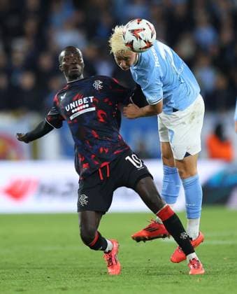 Mohamed Diomande of Rangers competes for the ball with Otto Rosengren of Malmo Malmo v Rangers, UEFA Europa League, Group Stage, Football, Eleda Stadion, Malmo, Sweden, 26 Sep 2024 EDITORIAL USE ONLY No use with unauthorised audio, video, data, fixture lists, club league logos or live services. Online in-match use limited to 120 images, no video emulation. No use in betting, games or single club league player publications. Copyright: xMichaelxZemanek Shutterstockx 14739047ay