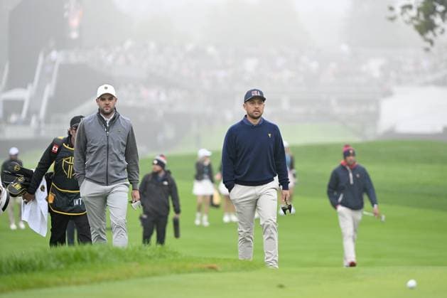 September 28, 2024, Montreal, Pq, Canada: Corey Conners, left, of Canada, and USA s Xander Schauffele walk onto the first green during third round four-ball play at the Presidents Cup golf tournament at Royal Montreal Golf Club, in Montreal, Saturday, Sept. 28, 2024. Canada News - September 28, 2024 - ZUMAc35_ 20240928_zaf_c35_007 Copyright: xGrahamxHughesx