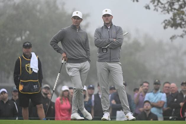 September 28, 2024, Montreal, Pq, Canada: Adam Scott, left, of Australia, and Taylor Pendrith, of Canada, look on at the first green during third round four-ball play at the Presidents Cup golf tournament at Royal Montreal Golf Club, in Montreal, Saturday, Sept. 28, 2024. Golf 2024: Presidents Cup: Round Three - ZUMAc35_ 20240928_zaf_c35_009 Copyright: xGrahamxHughesx