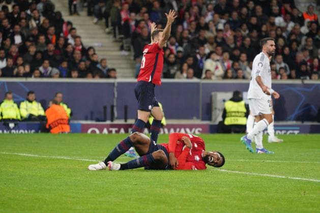 Alexsandro of Lille goes down injured in dramatic style Lille v Real Madrid, UEFA Champions League, Group Stage, Football, Pierre Mauroy Stadium, Lille, France, 02 Oct 2024 EDITORIAL USE ONLY No use with unauthorised audio, video, data, fixture lists, club league logos or live services. Online in-match use limited to 120 images, no video emulation. No use in betting, games or single club league player publications. Copyright: xDavexWinter Shutterstockx 14750773kz