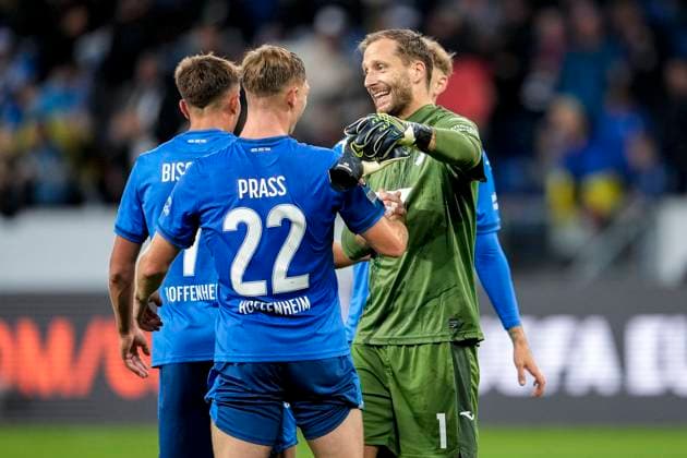 v.li.: Alexander Prass (Hoffenheim, 22), Oliver Baumann (Torwart, Hoffenheim, 1), Spieler der TSG 1899 Hoffenheim, Jubel nach dem Schlusspfiff, Freude über den Sieg, Sieger, Gewinner, jubelt, jubeln, fröhlich, positiv, freut sich, freuen, optimistisch, Highlight, Action, Aktion, 03.10.2024, Sinsheim (Deutschland), Fussball, UEFA Europa League, Gruppenphase, TSG 1899 Hoffenheim - Dynamo Kiew, REGULATIONS PROHIBIT ANY USE OF PHOTOGRAPHS AS IMAGE SEQUENCES AND OR QUASI-VIDEO.