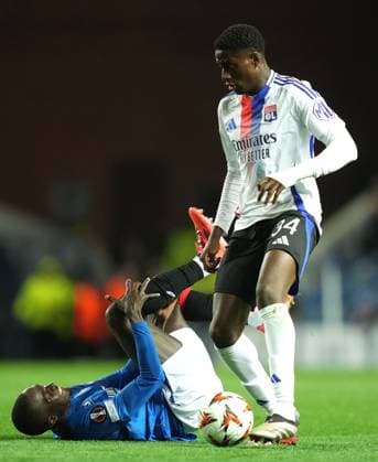 Rangers Mohammed Diomande and Mahamadou Diawara of Olympique Lyonnais during the UEFA Europa League match between Rangers FC and Olympique Lyonnais at Ibrox Stadium, Glasgow on 3rd October, 2024. Rangers v Lyon, UEFA Europa League, Group Stage, Football, Ibrox Stadium, Glasgow, Scotland, UK, 03 Oct 2024 EDITORIAL USE ONLY No use with unauthorised audio, video, data, fixture lists, club league logos or live services. Online in-match use limited to 120 images, no video emulation. No use in betting, games or single club league player publications. Copyright: xMarkxRunnacles Shutterstockx 14750818de