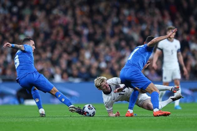 Anthony Gordon of England is challenged by Giorgos Masouras of Greece England v Greece, UEFA Nations League, League B, Group 2, Football, Wembley Stadium, London, UK, 10 Oct 2024 EDITORIAL USE ONLY No use with unauthorised audio, video, data, fixture lists, club league logos or live services. Online in-match use limited to 120 images, no video emulation. No use in betting, games or single club league player publications. Copyright: xMichaelxZemanek Shutterstockx 14767424ay