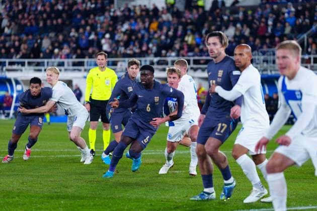Players grapple during a corner kick Finland v England, UEFA Nations League, League B, Group 2, Football, Helsinki Olympic Stadium, Helsinki, Finland, 13 Oct 2024 EDITORIAL USE ONLY No use with unauthorised audio, video, data, fixture lists, club league logos or live services. Online in-match use limited to 120 images, no video emulation. No use in betting, games or single club league player publications. Copyright: xJavierxGarcia Shutterstockx 14776794cj