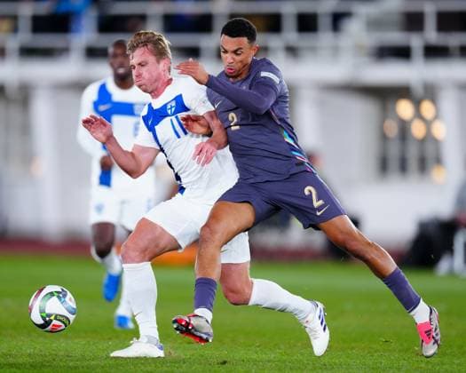 Trent Alexander-Arnold of England and Rasmus Schüller of Finland Finland v England, UEFA Nations League, League B, Group 2, Football, Helsinki Olympic Stadium, Helsinki, Finland, 13 Oct 2024 EDITORIAL USE ONLY No use with unauthorised audio, video, data, fixture lists, club league logos or live services. Online in-match use limited to 120 images, no video emulation. No use in betting, games or single club league player publications. Copyright: xJavierxGarcia Shutterstockx 14776794cm