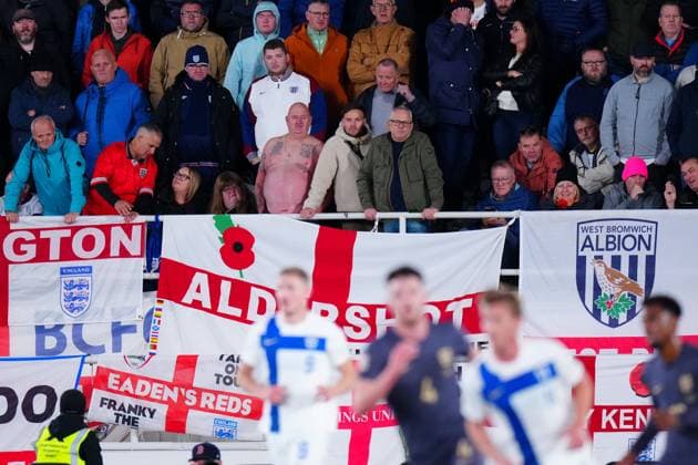 England fans look on Finland v England, UEFA Nations League, League B, Group 2, Football, Helsinki Olympic Stadium, Helsinki, Finland, 13 Oct 2024 EDITORIAL USE ONLY No use with unauthorised audio, video, data, fixture lists, club league logos or live services. Online in-match use limited to 120 images, no video emulation. No use in betting, games or single club league player publications. Copyright: xJavierxGarcia Shutterstockx 14776794cv