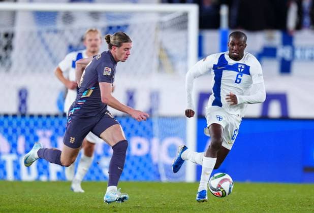 Conor Gallagher of England and Glen Kamara of Finland Finland v England, UEFA Nations League, League B, Group 2, Football, Helsinki Olympic Stadium, Helsinki, Finland, 13 Oct 2024 EDITORIAL USE ONLY No use with unauthorised audio, video, data, fixture lists, club league logos or live services. Online in-match use limited to 120 images, no video emulation. No use in betting, games or single club league player publications. Copyright: xJavierxGarcia Shutterstockx 14776794ie