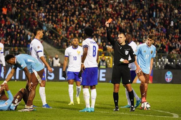 Aurelien Tchouameni of France receives a red card for a foul on Youri Tielemans of Belgium Belgium v France, UEFA Nations League, League A, Group 2, Football, Stade Roi Baudouin, Brussels, Belgium, 14 Oct 2024 EDITORIAL USE ONLY No use with unauthorised audio, video, data, fixture lists, club league logos or live services. Online in-match use limited to 120 images, no video emulation. No use in betting, games or single club league player publications. Copyright: xDavexWinter Shutterstockx 14783126bl