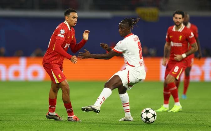 Trent Alexander-Arnold of Liverpool and Amadou Haidara of RB Leipzig in action RB Leipzig v Liverpool, UEFA Champions League, Group Stage, Football, Red Bull Arena, Leipzig, Germany, 23 Oct 2024 EDITORIAL USE ONLY No use with unauthorised audio, video, data, fixture lists, club league logos or live services. Online in-match use limited to 120 images, no video emulation. No use in betting, games or single club league player publications. Copyright: xKieranxMcManus Shutterstockx 14801646n