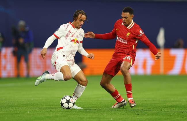 Xavi Simons of RB Leipzig and Trent Alexander-Arnold of Liverpool in action RB Leipzig v Liverpool, UEFA Champions League, Group Stage, Football, Red Bull Arena, Leipzig, Germany, 23 Oct 2024 EDITORIAL USE ONLY No use with unauthorised audio, video, data, fixture lists, club league logos or live services. Online in-match use limited to 120 images, no video emulation. No use in betting, games or single club league player publications. Copyright: xKieranxMcManus Shutterstockx 14801646p